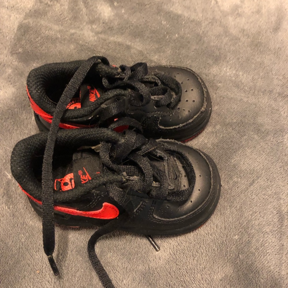 Black and red Nike shoes